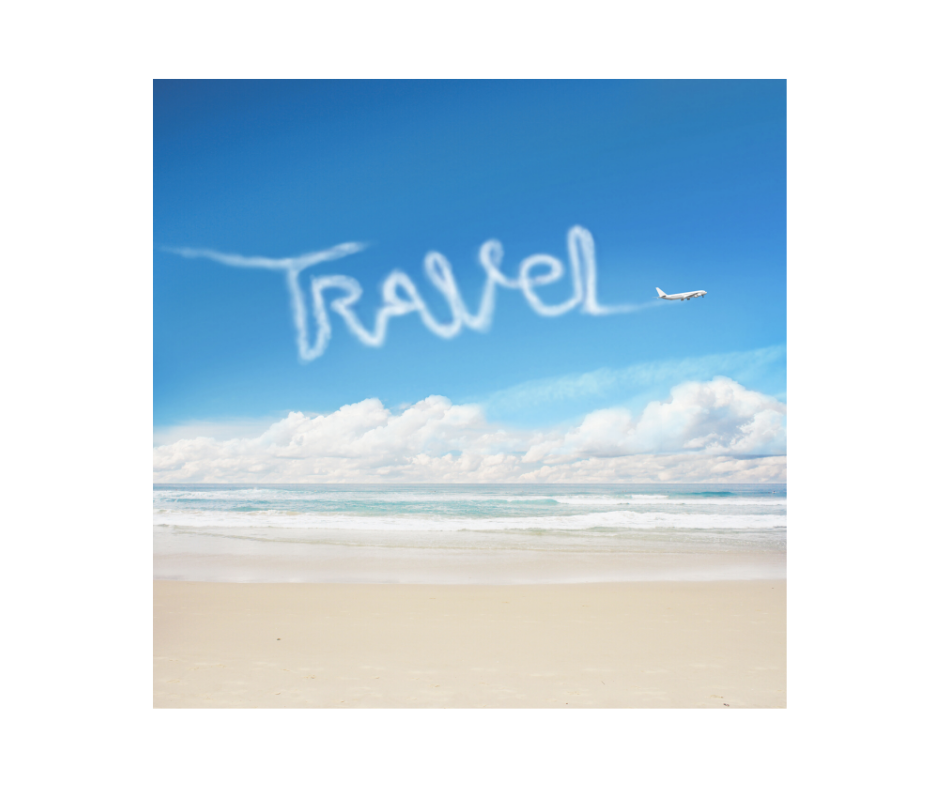 Picture of the word travel written out in the clouds in a bright blue sky.  There is a beach and water.